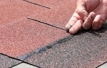 Down asphalt roof repairs
