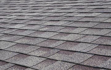 Down tiles for shallow pitch roofing